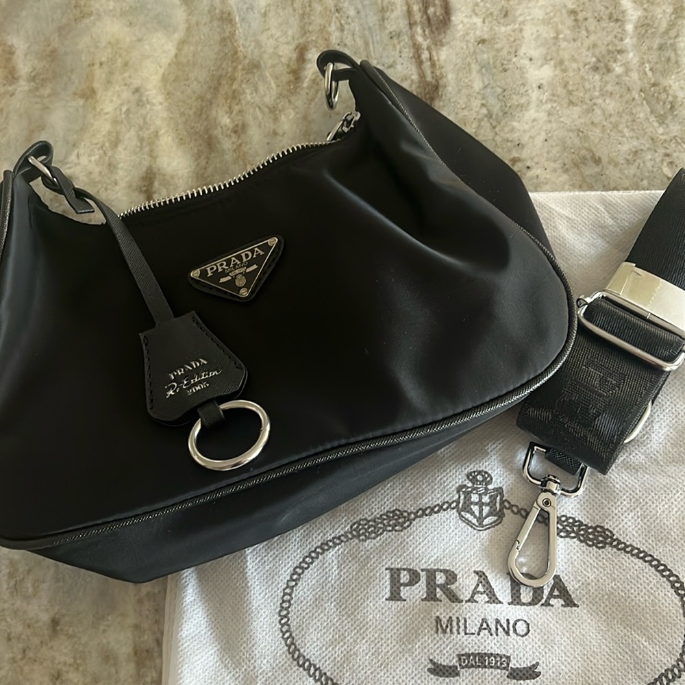Black nylon with strap and dust bag